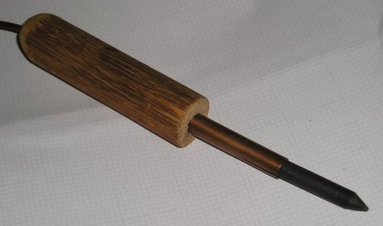 Resistance Soldering Iron made from an old broom handle, some copper water pipe, and the core of a 'D' cell battery.