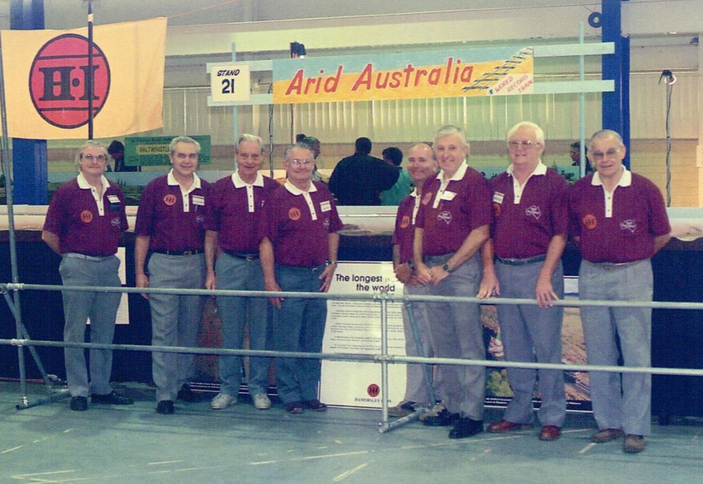 Most of the Arid Australia team at the 1996 AMRA Exhibition - Norm Chapple, (left), Don Finlayson, Len Hughes, Tony Gray, Kim Miller, Ian Rourke, Brian Few and Peter Scarfe. Not present in the photo - Henry Brooks and Peter Tullis. Photo taken on June 03 1996 - courtesy Don Finlayson.